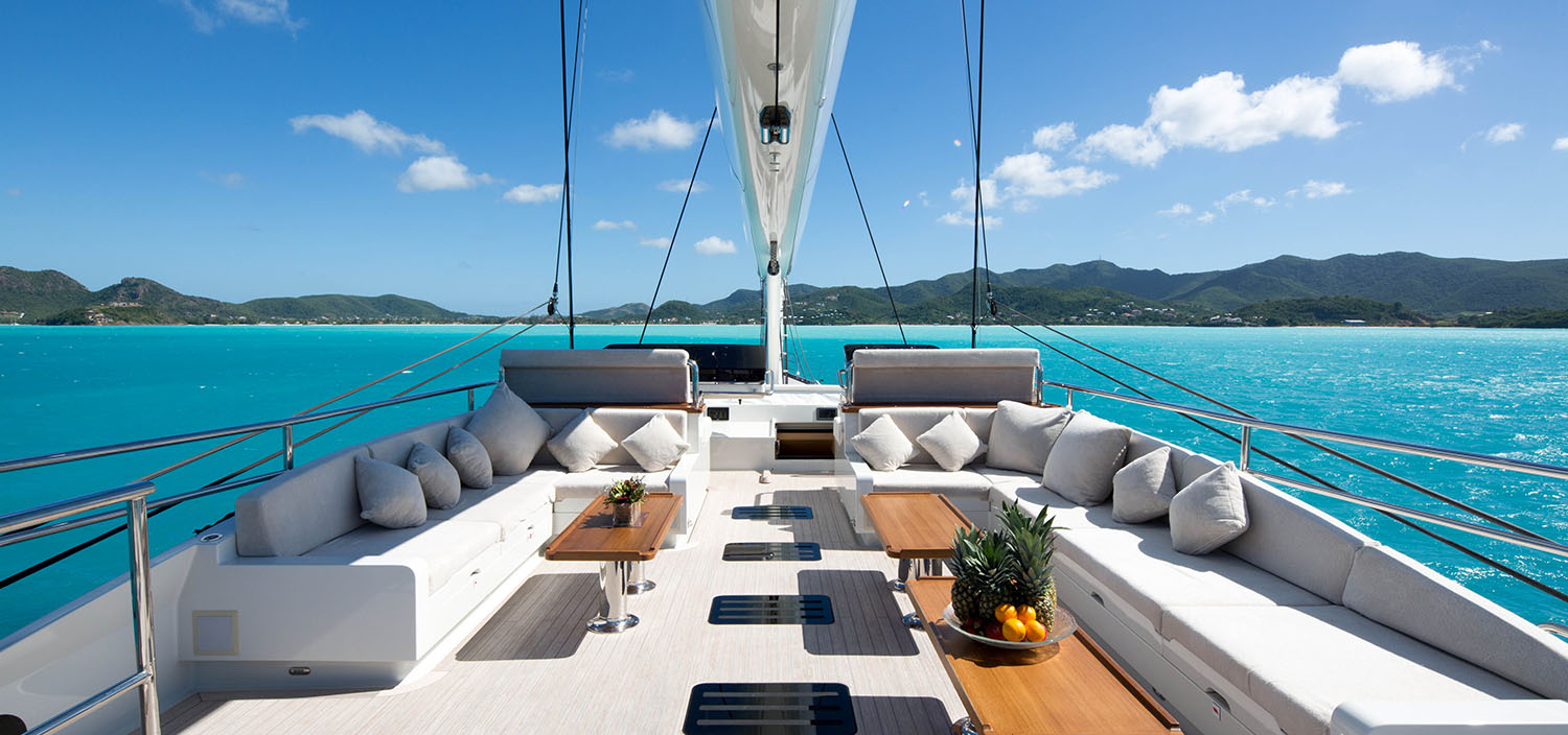 Sail to azure waters on a charter yacht with Fraser